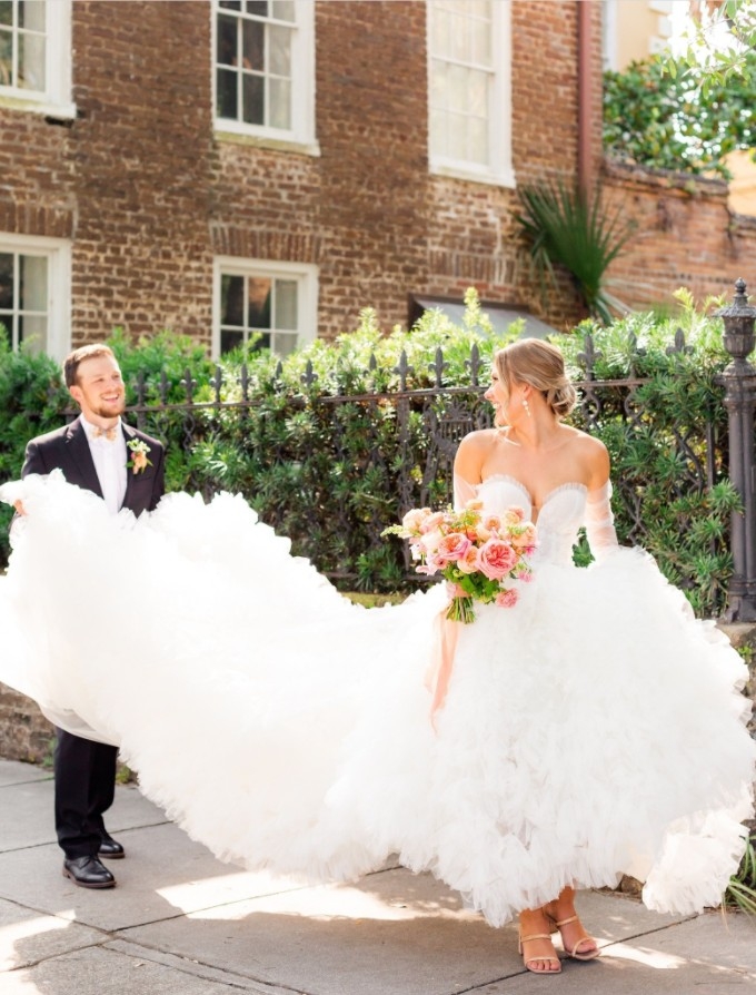 Photo of the smiling real bride and groom